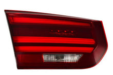 Load image into Gallery viewer, Hella 2012-2019 BMW 320i Left Tail Light

