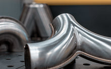 Load image into Gallery viewer, MagnaFlow Smooth Trans U 2.50inch SS 180 deg.
